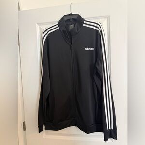 NWOT men’s Adidas Black and White Track Jacket, size XL. Never worn.